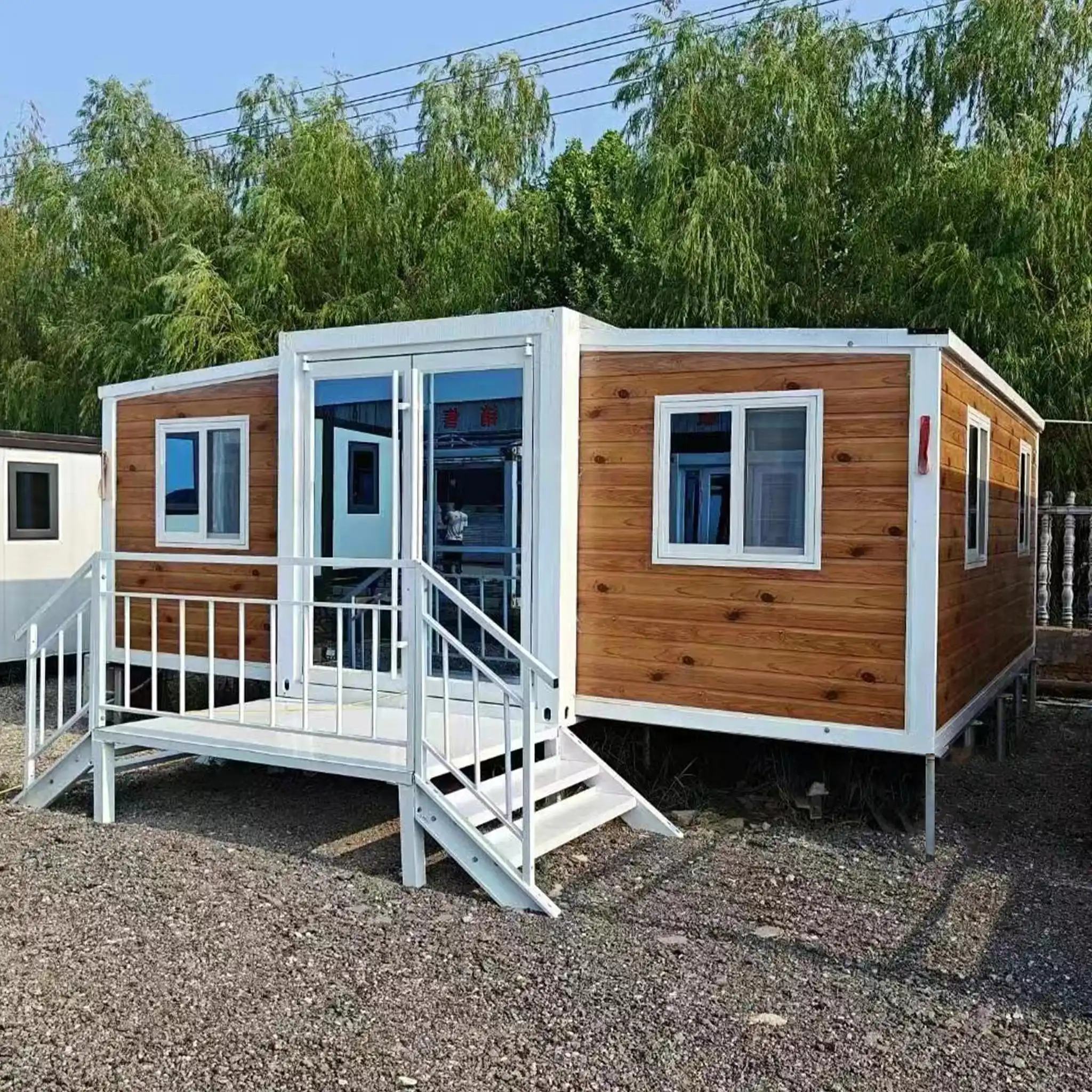 Expandable container home for resort projects